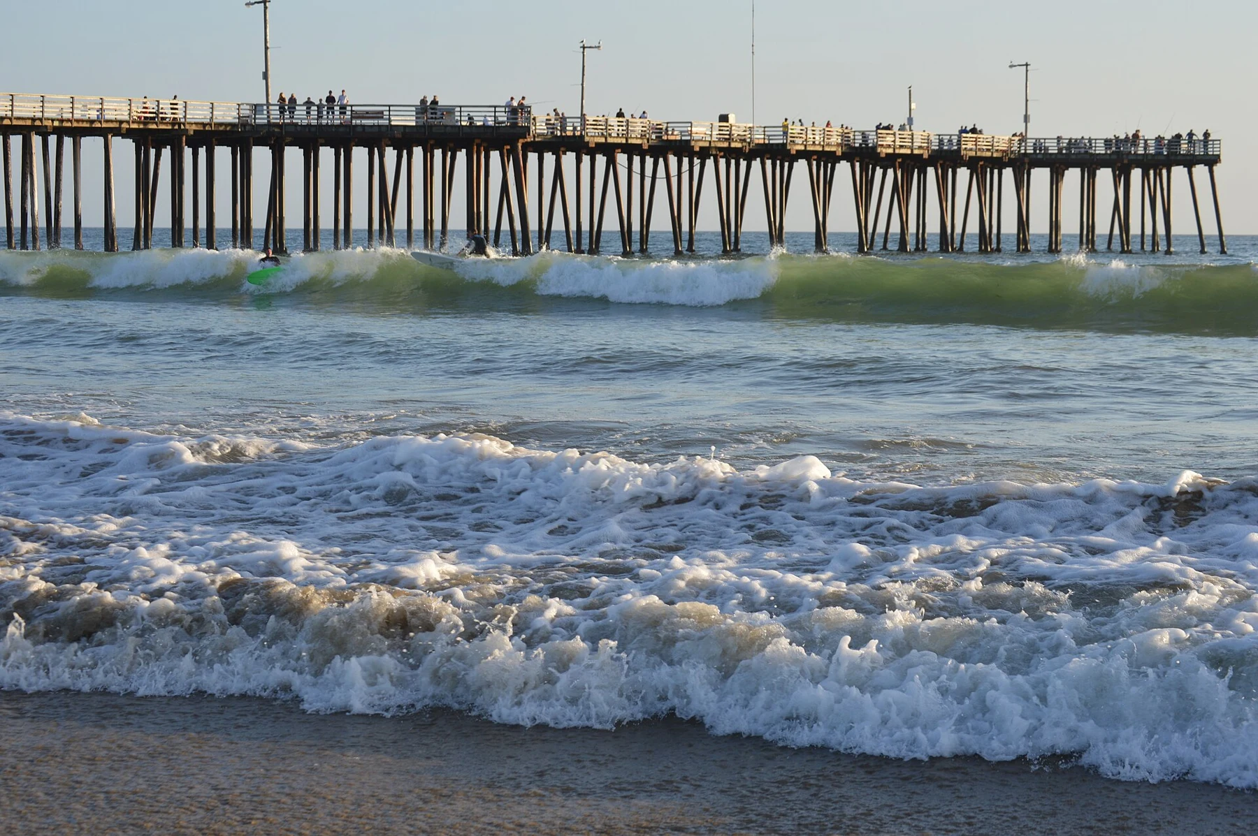 Waves beneath the Pismo Beach pier